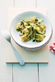 Styrian potato salad with lettuce, cucumber, pumpkin seeds and cress