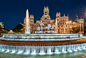 The Palacio de Cibeles and the Fuente de Cibeles fountain in Madrid, Spain