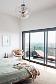 Bedroom with balcony and panoramic view