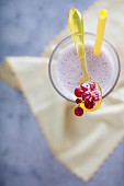 A cocktail with sugared redcurrants