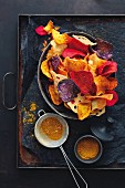 Colourful vegetable chips with ras el hanout spice mix