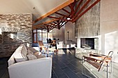 Living room with stone walls in modern house