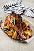 Roast leg of turkey with vegetables