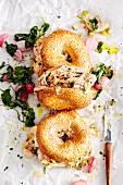 Bagels filled with cold meat salad and oven-baked radishes (soul food)