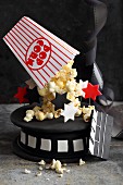 A popcorn cake with fondant icing for movie buffs