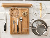 Kitchen utensils for cooking vegetables in parchment
