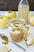 Apple sauce with cream and passion fruit