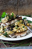 Scrambled eggs with wild mushrooms and farmhouse bread