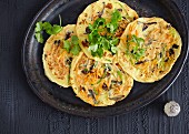 Small vegetable pancakes with wood ear mushrooms and shoots (Asia)