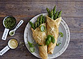 Vegetarian pancakes with green asparagus and almonds