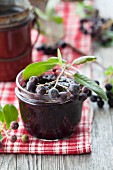 Aronia jam in a glass