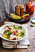 Avocado salad with feta and pickled swiss chard stems