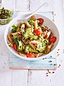 Wholewheat pasta with broccoli, tomatoes and sunflower pesto