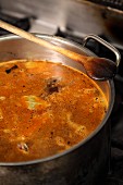Veal stock with tomato paste