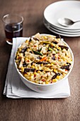 Bowl of Mexican tortilla casserole with corn