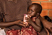 Young child drinking