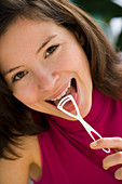 Woman cleaning teeth