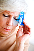 Woman using a gel pack