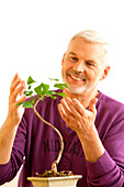 Man with bonsai