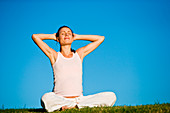 Pregnant woman practising yoga