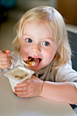 Child eating yogurt