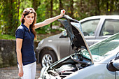 Woman with a car trouble