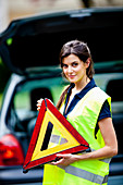 Road safety triangle and vest