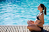 Pregnant woman doing yoga