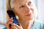Elderly person using phone