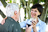 Senior couple drinking wine