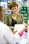 Woman in pharmacy