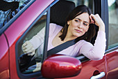 Stressed woman car driving