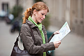 Woman using map