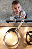 Baby near stove