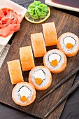Sushi rolls philadelphia with caviar, salmon and avocado