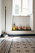 Collection of figurines from Snow White and the Seven Dwarfs in window niche