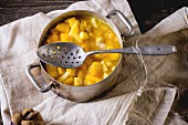 Making mango chutney or jam in vintage aluminum pan