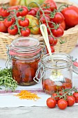 Cherry tomatoes in preserving jars