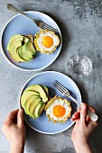 Baked eggs in potato nests with avocado toast
