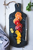 Citrus fruits on a marble chopping board