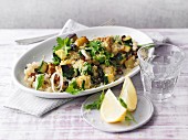 Quinoa salad with aubergines, raisins and fresh coriander