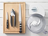 Kitchen utensils: blender, knife, can opener