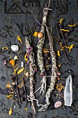 Homemade incense sticks, cones, and herbs for smoking, with crystals