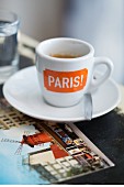 An espresso cup at the 'Parisien' café in Paris, France