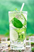 Ice cold cocktail with lime and mint