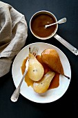 Poached pears with caramel sauce