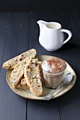Italian biscotti on plate with a cup of coffee
