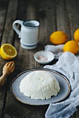 Homemade ricotta on a wooden table
