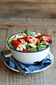 Quinoa salad with strawberry, avocado and spinach