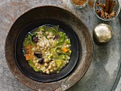 Pearl barley with chickpeas, cumin, cinnamon and prunes (Asia)